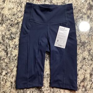 NWT Athleta Ultimate Stash Pocket 9” True Navy Back Drop In Pocket Size XXS
